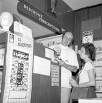 Student Visits Drugstore, 1975-1976 Scene 2 by Opal R. Lovett
