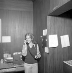 Student at Telephone, 1975-1976 Campus Scenes by Opal R. Lovett