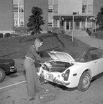 Student Loading Trunk of Car, 1975-1976 Campus Scenes 1 by Opal R. Lovett