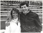 Two Stand Hugging in Football Stadium 2, circa 1980s by unknown