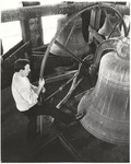 Man in Bell Tower of The Church of St. Michael & All Angels by unknown