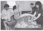 Nursing Students with Patient, circa 2000 by unknown