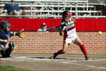 Softball Player in Action, circa 2006 by unknown