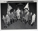 Group Inside Rowe Hall Dressed in Various Military Uniforms, circa 1996 by unknown