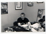Individual Seated in Office, circa 1989 by unknown
