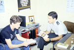 ROTC Interview in Office, circa 1986 by unknown