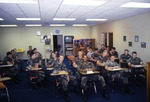 ROTC Individuals Seated at Desks, circa 1986 by unknown
