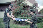 JSU ROTC Students Fold Flag 2, circa 1988 by unknown