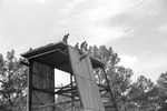Individual Rappelling Down ROTC Rappel Tower 14, circa 1986 by unknown