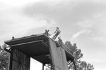 Individual Rappelling Down ROTC Rappel Tower 3, circa 1985 by unknown