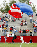 Sky Divers Land in Football Stadium, 2003 Preview Day 9 by Steve Latham