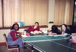 Eating at Table Tennis Table, circa 1998 by unknown